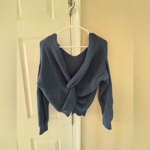 Blue crossed sweater